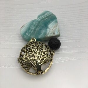 Tree of Life Aromatherapy Brass tone Locket.  Lava stone included.
